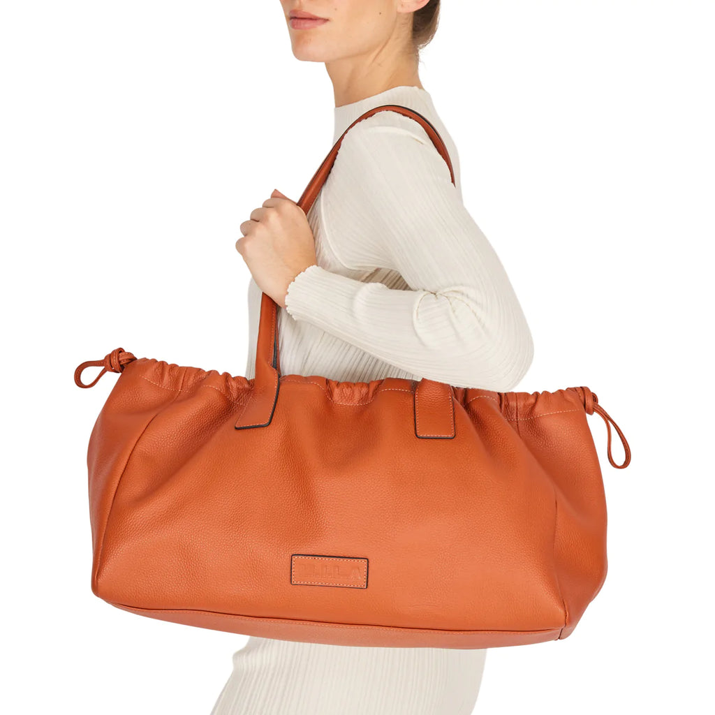 Designer Handbags: Some Reasons to Buy Them